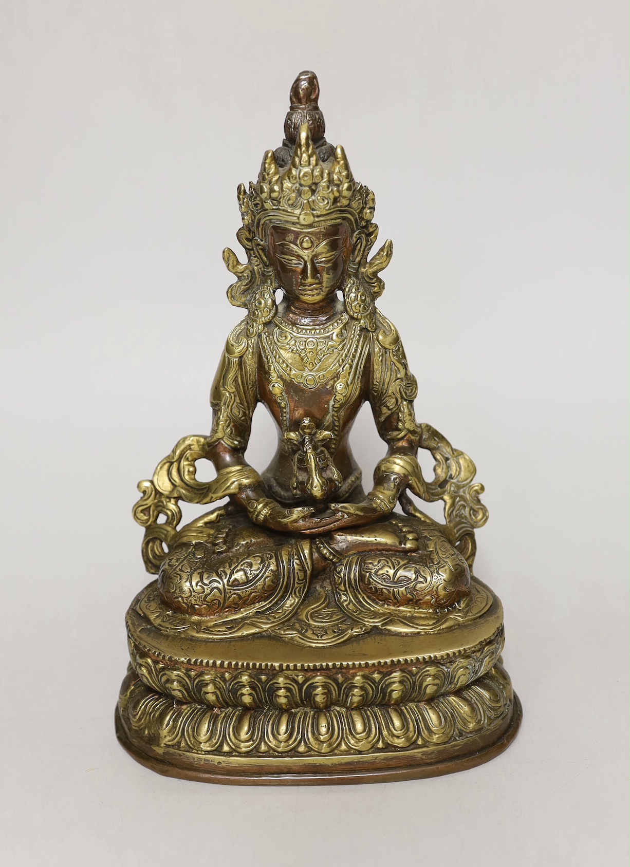 A Buddhist gilt copper alloy figure of a Bodhisattva, 22cm high